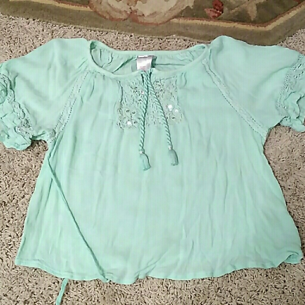 I am selling a size 8 in children tealish green